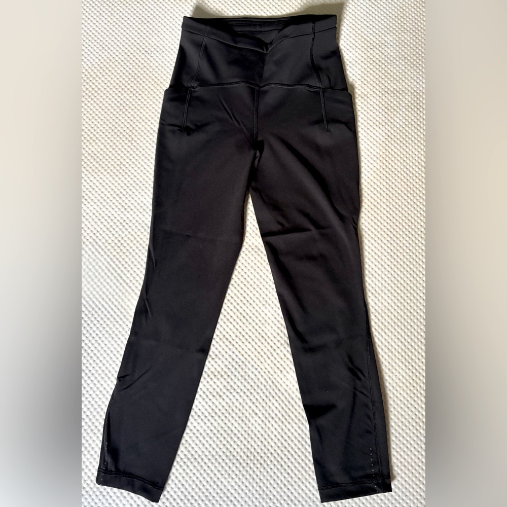 Lululemon Swift Speed High-Rise Tight 23” Black Leggings.